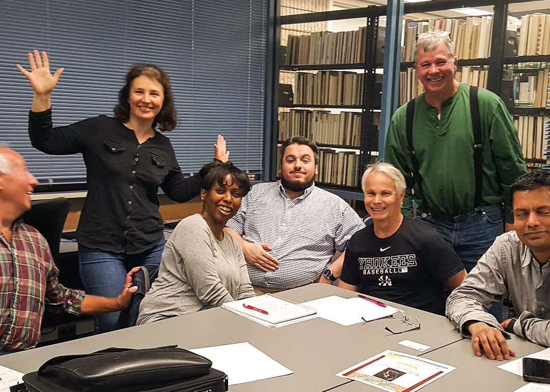group of older students taking a group picture